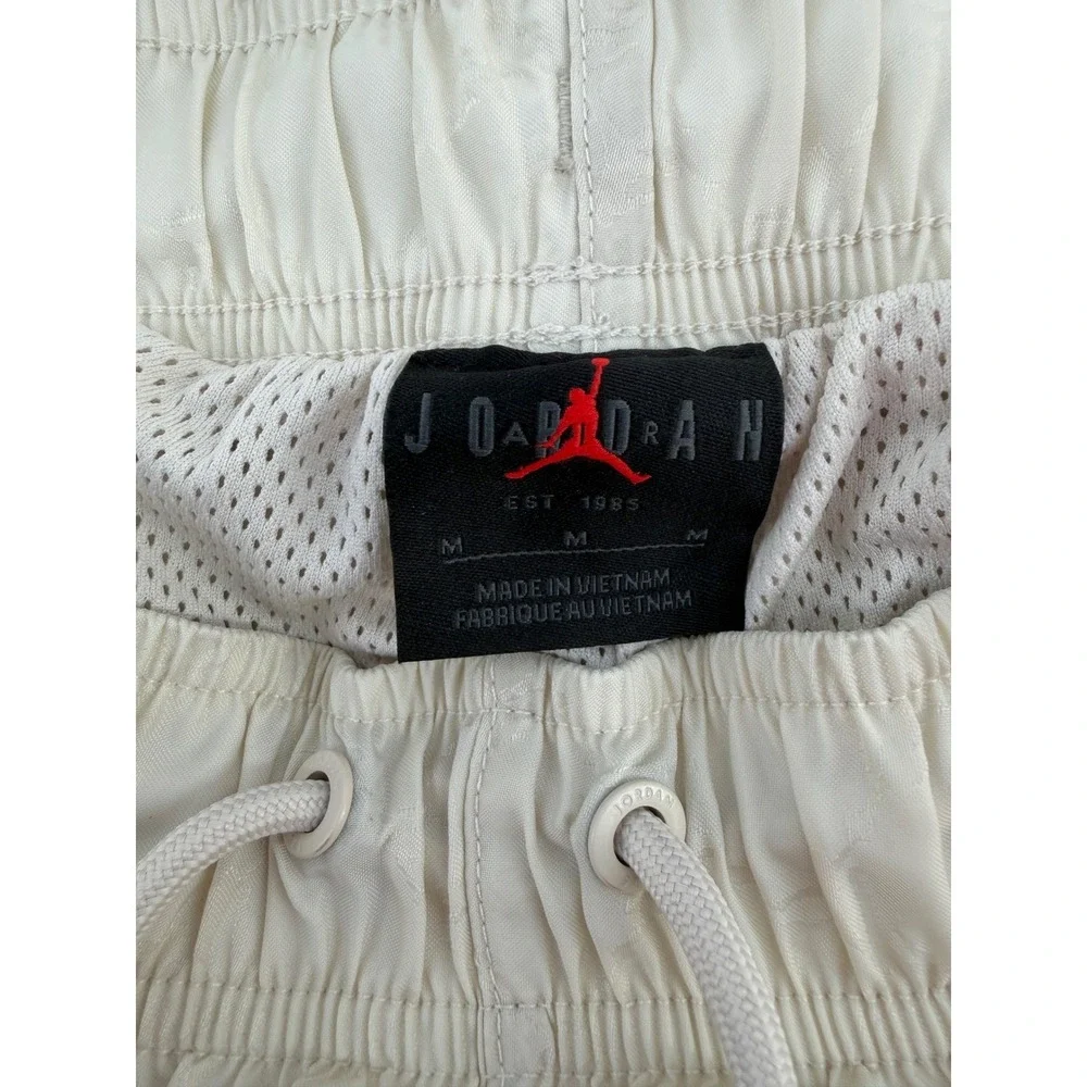 Nike Jordan Jumpman AOP Track Pants Mens M Beige Cream Wide Leg Adjustable Hem‎